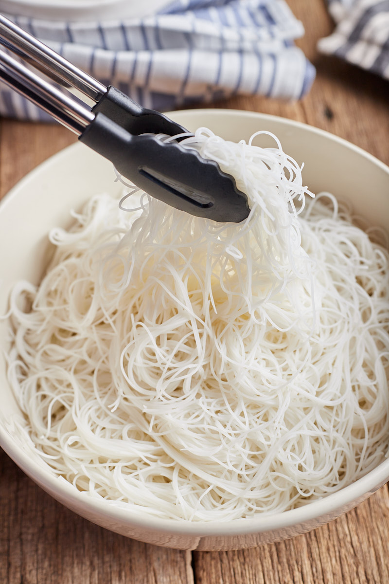 Lift noodles up out in the bowl with fork, and spread them to cooking.