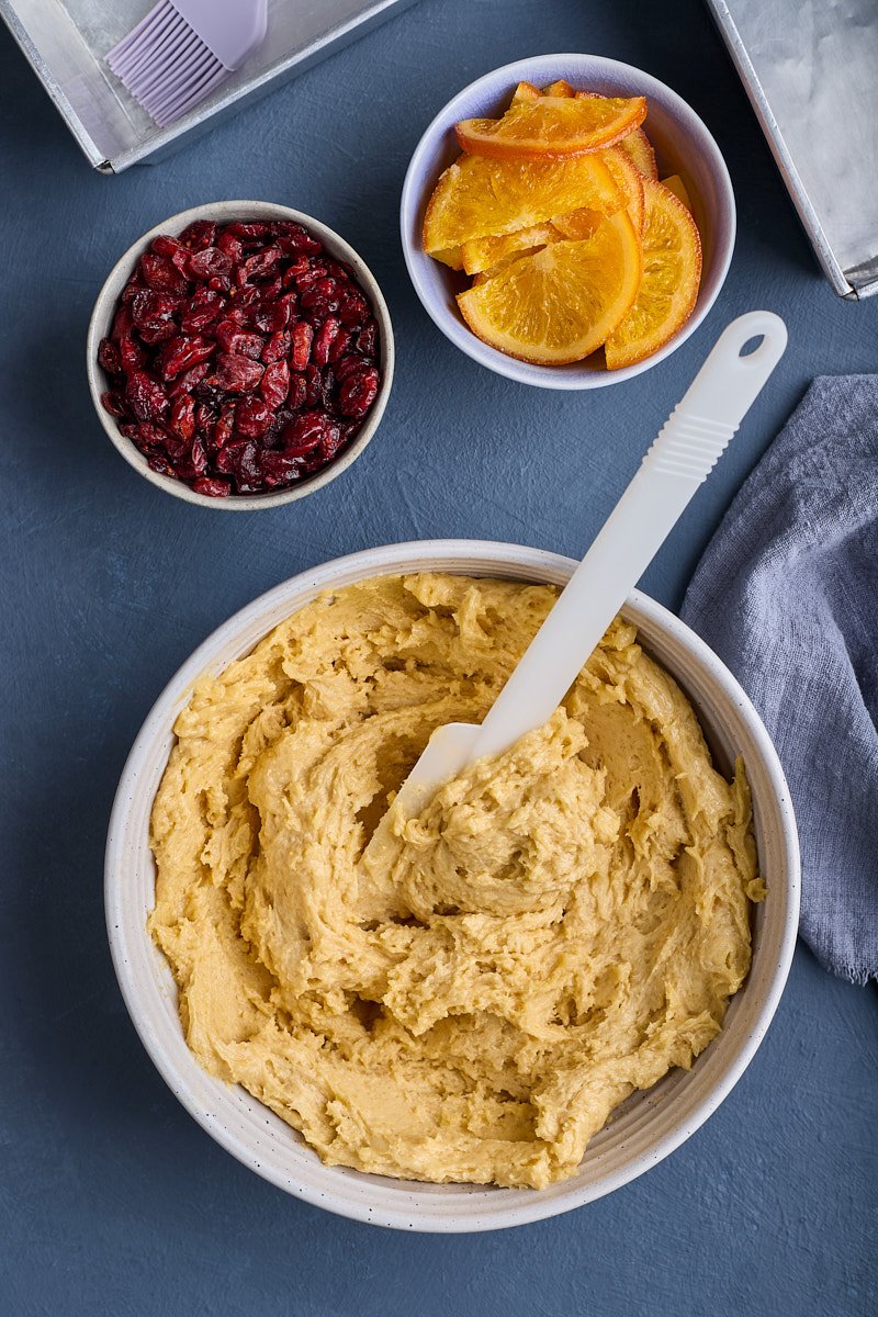 Fold in the flour and dried fruits.