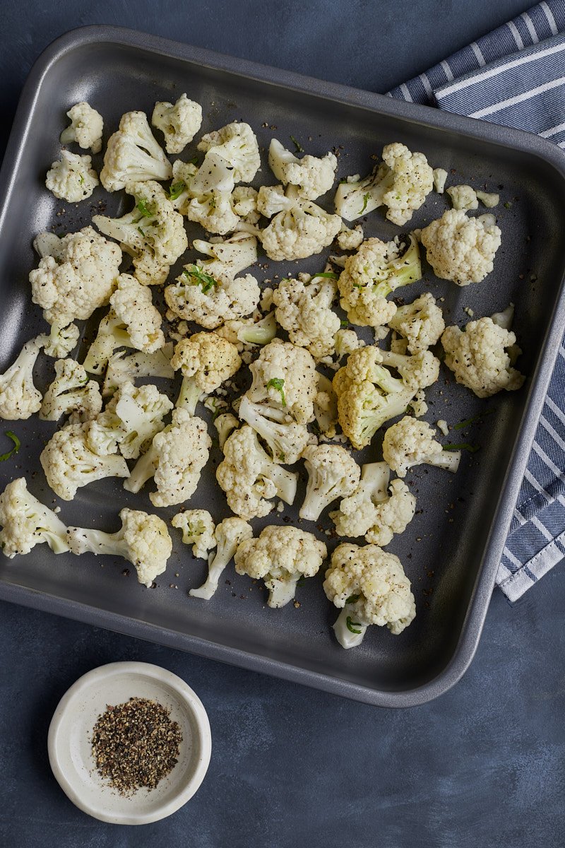 Roast cauliflower in oven with black pepper.