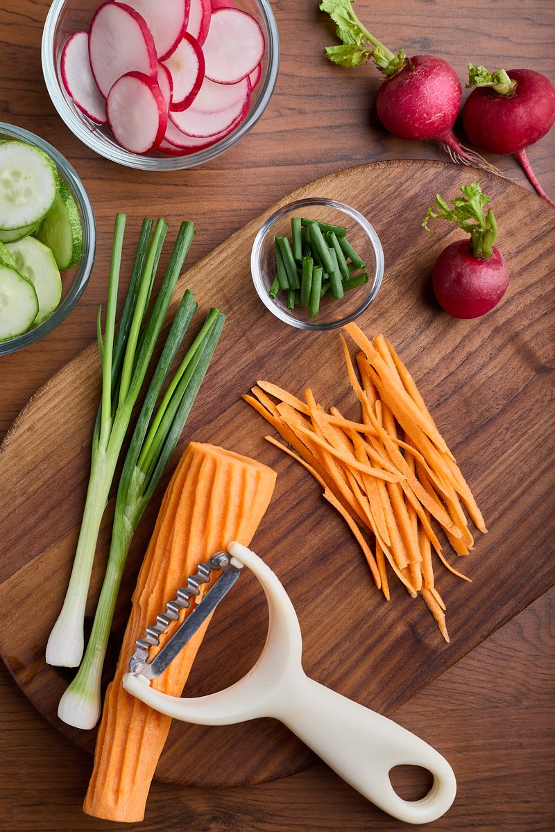 Great carrot and cut fresh green onion than slice radish.