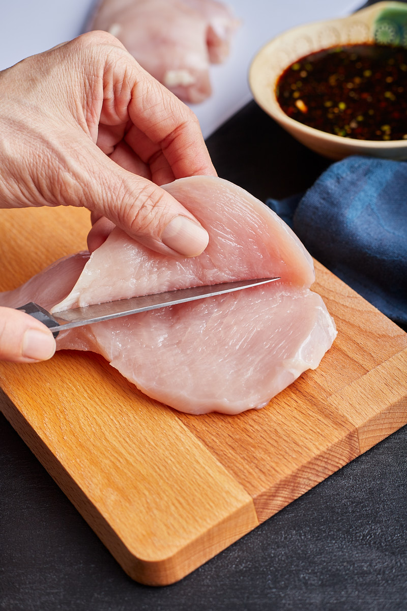 Use a sharp knife to slice the chicken.