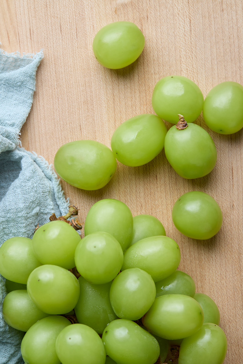 Add some of green grapes.