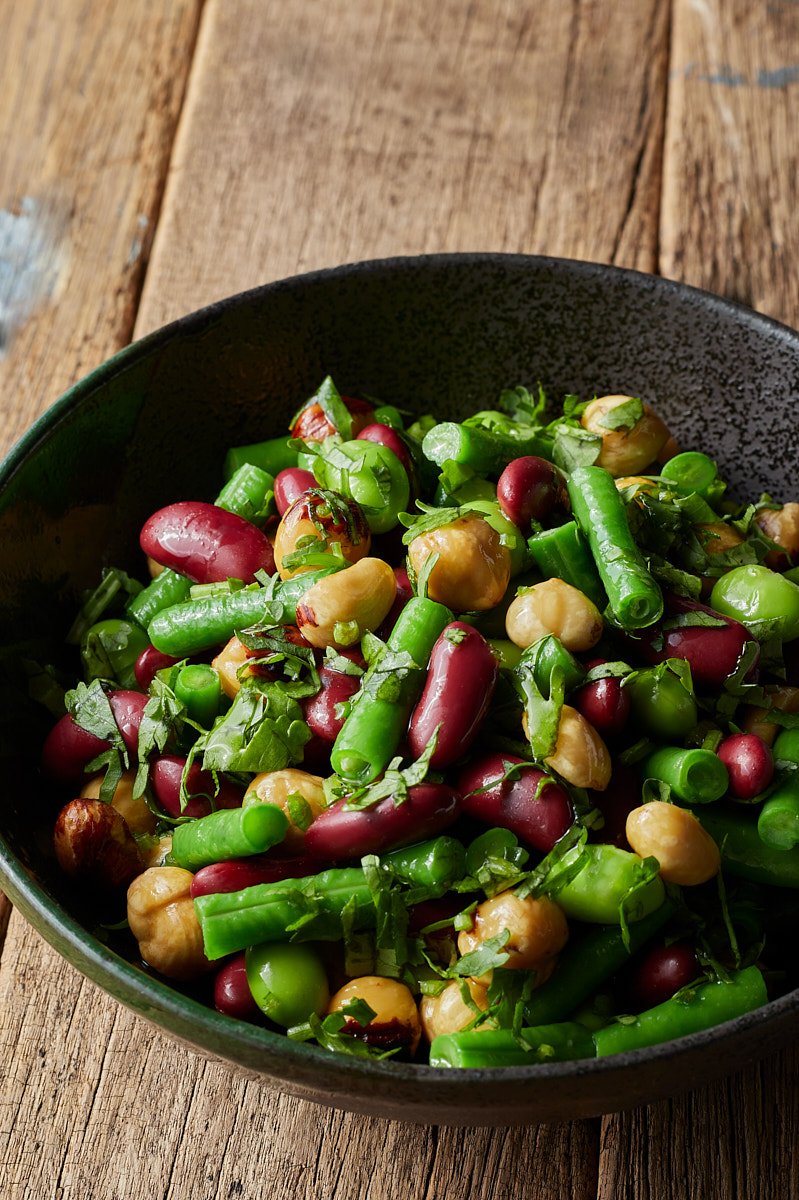 Make a crunchy salad with toast nuts.