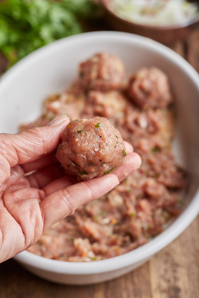 Combine the ingredients into the large bowl and scoop out 1 tablespoon of the meat mixture.