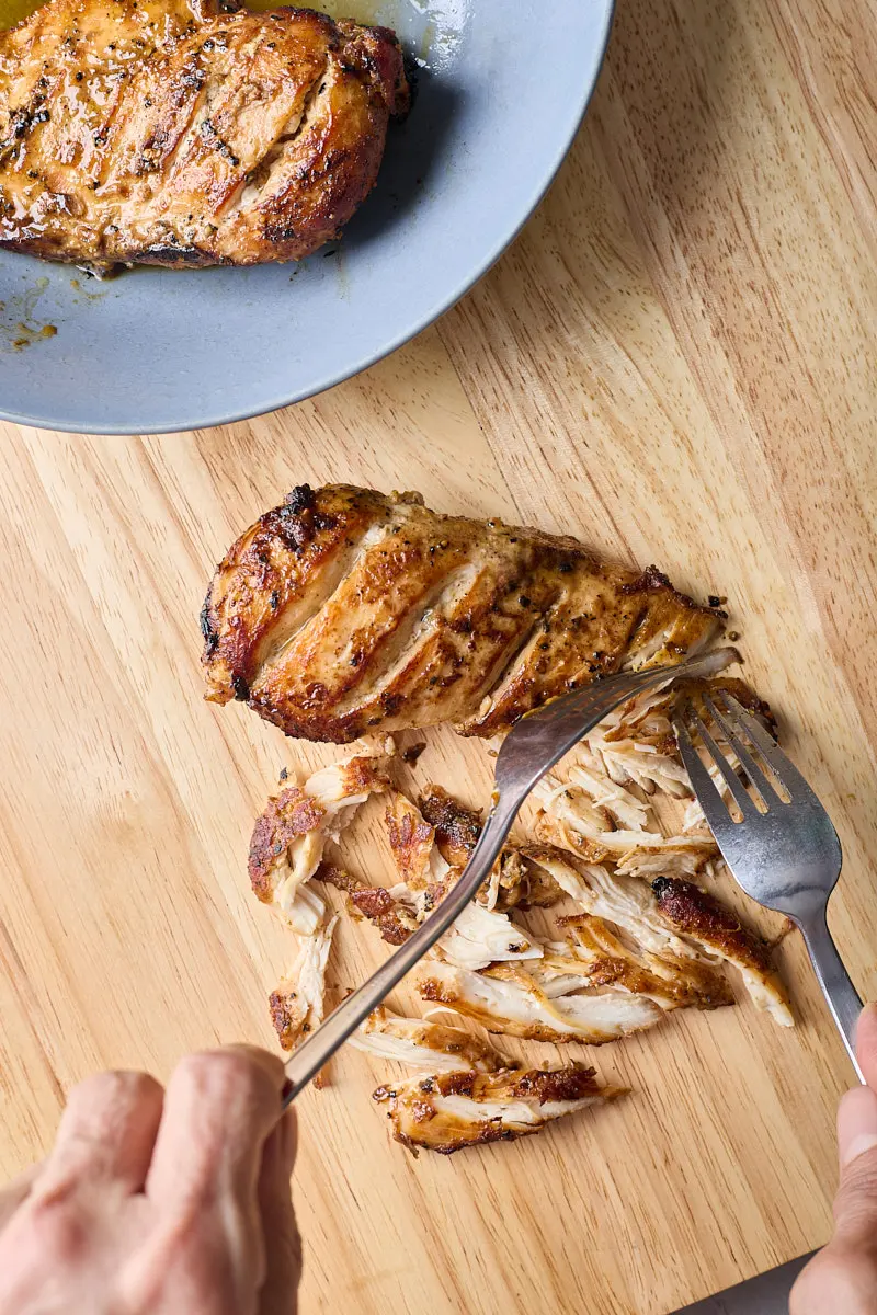 Using 2 forks to shared chicken is a great method for all type of meat.