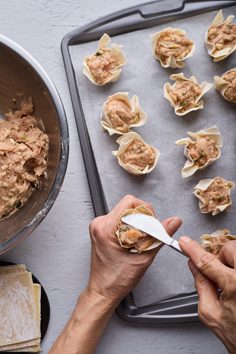 Fill dumpling dough and flatten the top.