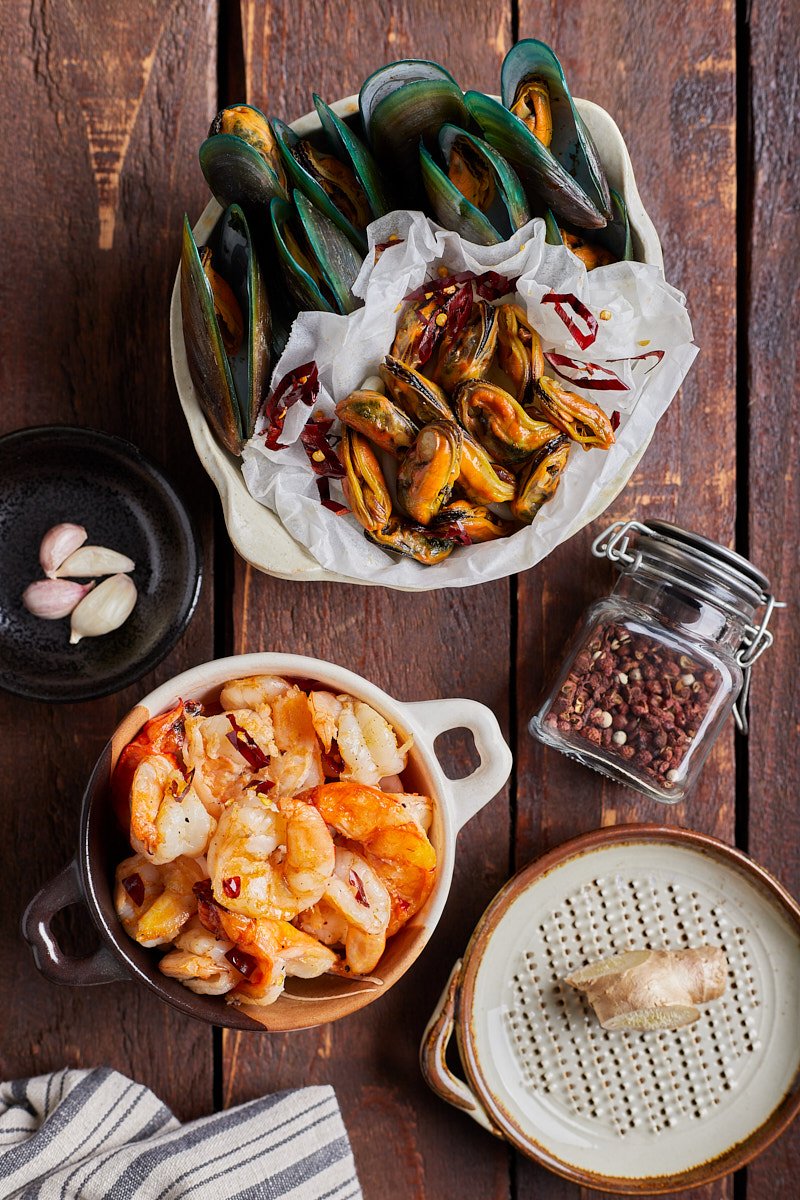 Preparing seafood and spices ready for stir-fry.