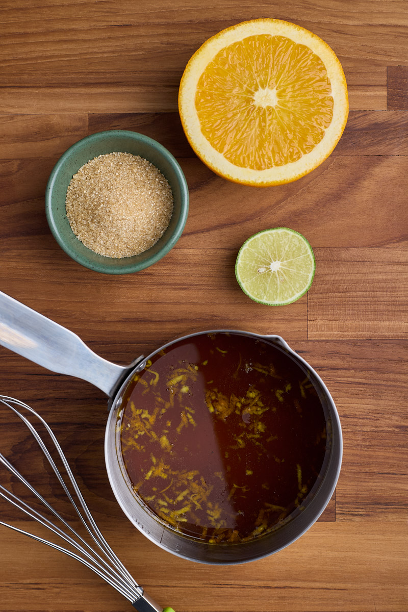 Combine syrup ingredients and orange zest in a sauce pan.