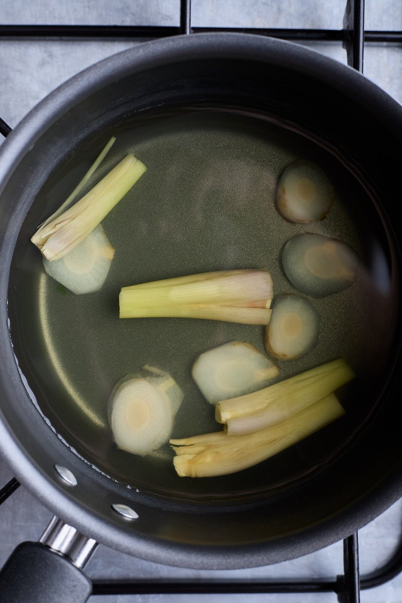 Simmer herbs soup.